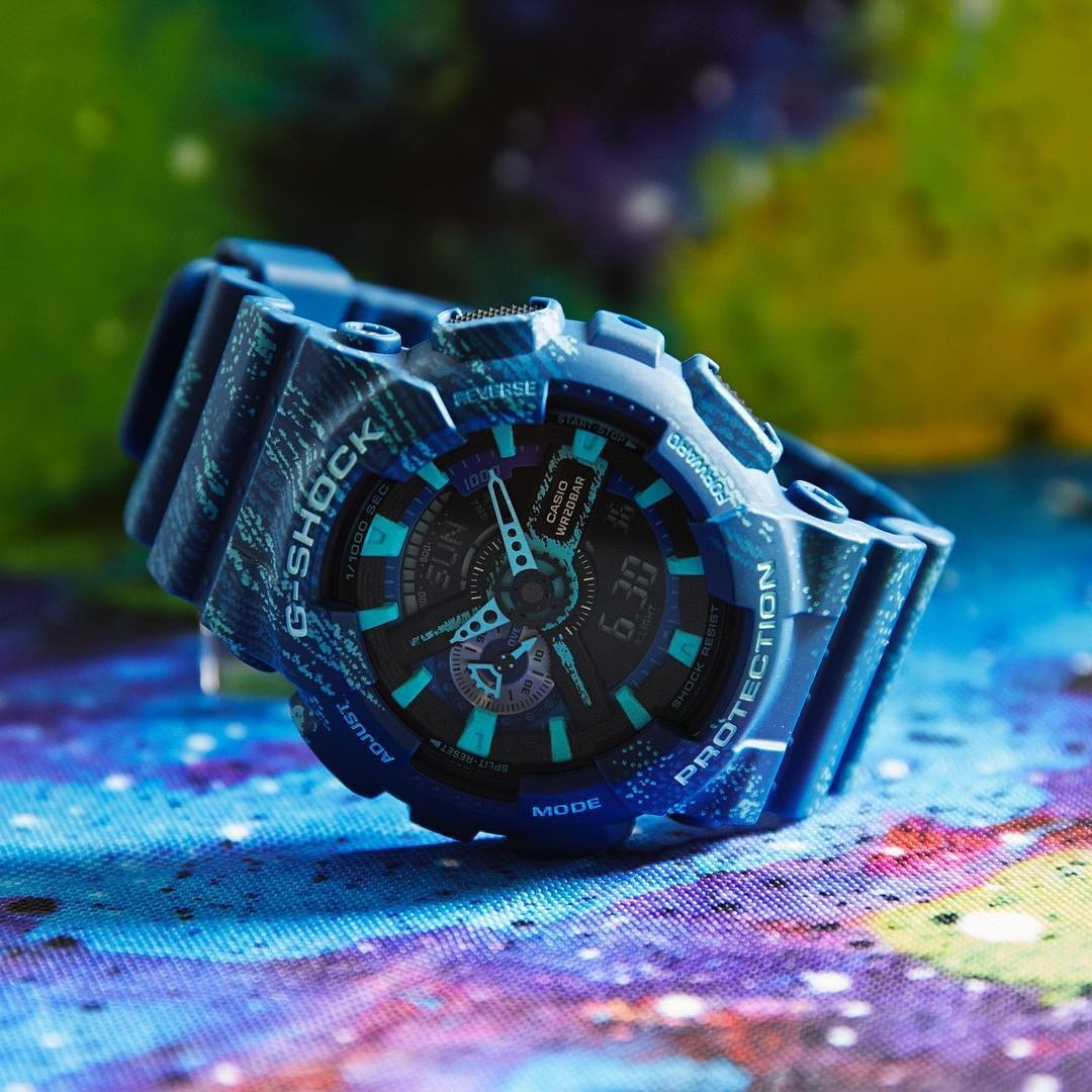 Digi Bear Casio G-Shock GA-110TX-2ADR blue resin sports watch with a unique speckled pattern and digital display