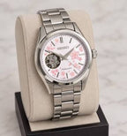 Digi Bear Seiko HFB012J JDM automatic watch with a silver stainless steel band and pink cherry blossom dial