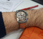 Digi Bear Seiko SBTR026 chronograph watch with a rose gold dial and stainless steel bracelet on a man's wrist