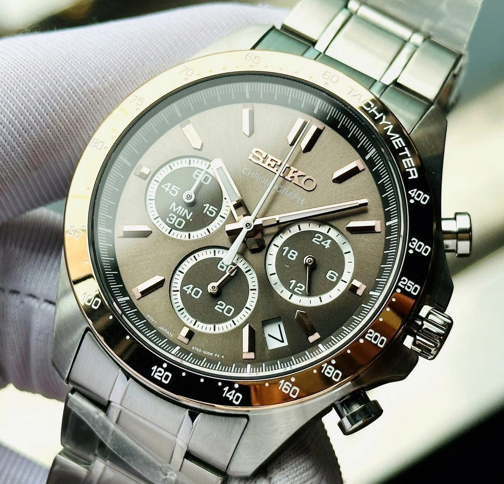 Digi Bear Seiko SBTR026 chronograph watch with a grey dial, rose gold accents, and a stainless steel bracelet.