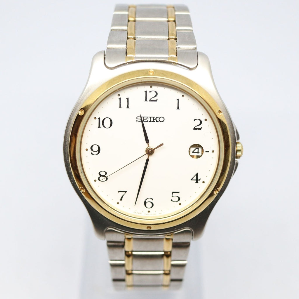Digi Bear Seiko SCXA028 classic watch with a two-tone silver and gold stainless steel band and cream dial.