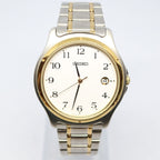 Digi Bear Seiko SCXA028 classic watch with a two-tone silver and gold stainless steel band and cream dial.