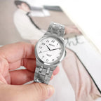 Digi Bear Seiko SCXP027 classic series watch with a white dial, black numerals, and a stainless steel bracelet.