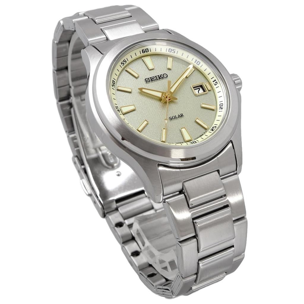 Digi Bear Seiko SBPN069 solar watch with a silver stainless steel bracelet and a textured champagne dial
