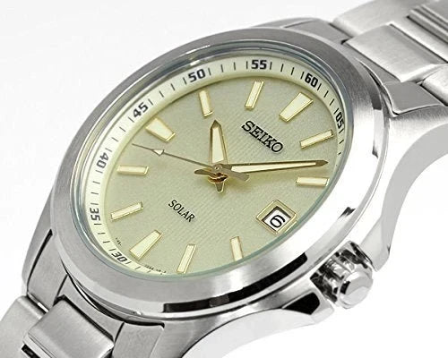 Digi Bear Seiko SBPN069 solar watch featuring a champagne dial, stainless steel case, and bracelet